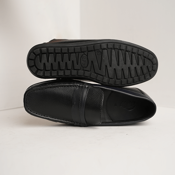 Dario Leather Penny Loafer in Black — rubber sole